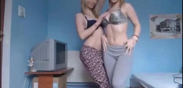  2 teen girls strips before webcame and poses